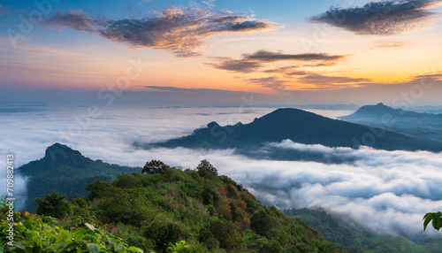Beautiful cloudscape over the mountain with sunrise and sea mist