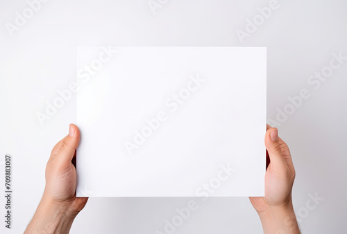 Wallpaper Mural Person Holding Paper in Hands, Image of a Simple Gesture Torontodigital.ca