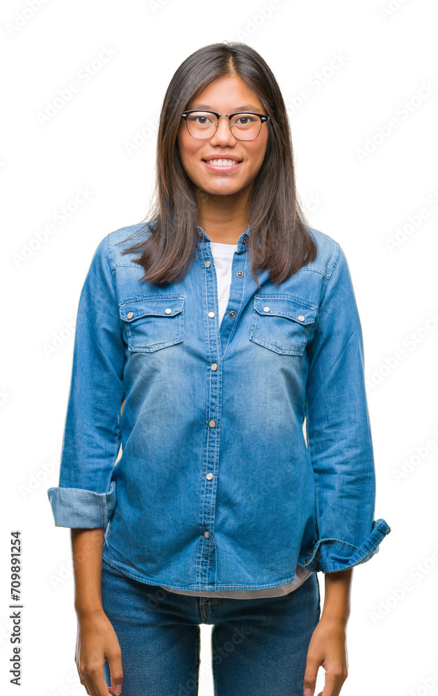 Young asian woman wearing glasses over isolated background with a happy and cool smile on face. Lucky person. Young asian woman wearing glasses over isolated background with a happy and cool smile on face. Lucky person.