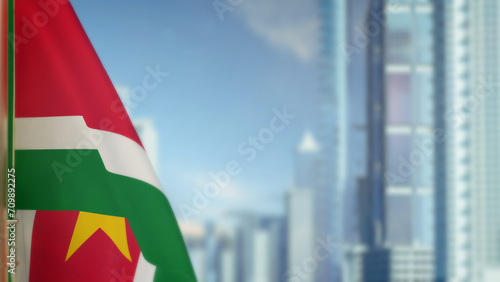 flag of Suriname on modern city architecture bokeh bg for national celebration - abstract 3D illustration photo