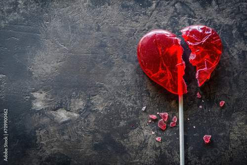 broken red heart-shaped candy, Valentine's day banner, painful love, emotional wounds 