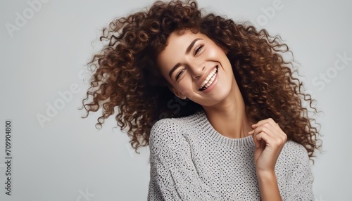 Young smiling positive woman, happy curly joyful cheerful girl student laughing, looking at camera