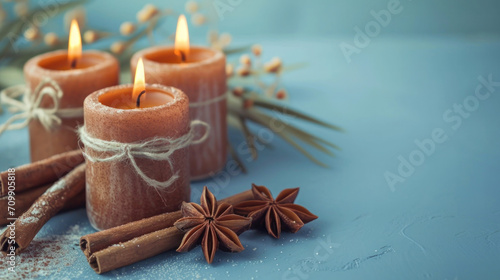 cinnamon scented candles on a mint background 