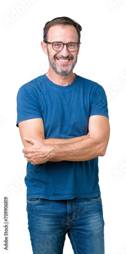 Handsome middle age hoary senior man wearin glasses over isolated background happy face smiling with crossed arms looking at the camera. Positive person.