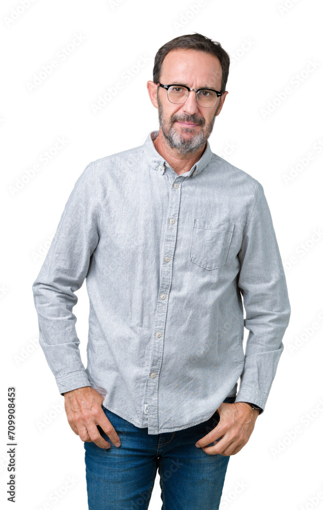 Handsome middle age elegant senior man wearing glasses over isolated background Relaxed with serious expression on face. Simple and natural looking at the camera. Handsome middle age elegant senior man wearing glasses over isolated background Relaxed with serious expression on face. Simple and natural looking at the camera.
