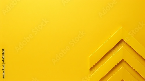 Bright yellow arrow stands out boldly against a monochromatic background photo
