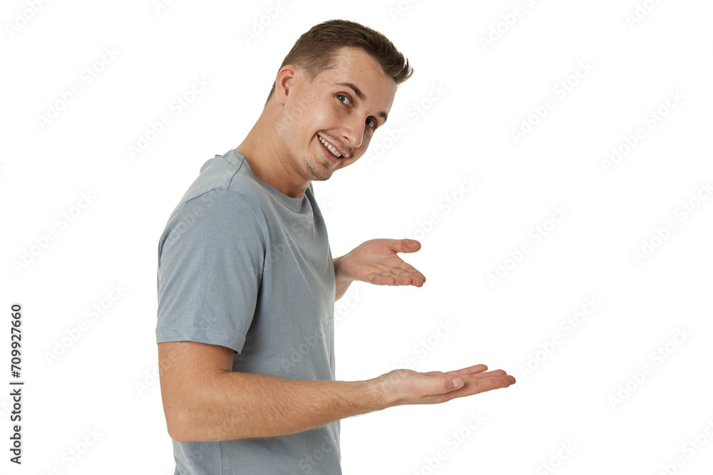 happy guy pointing at the copy space on white studio background happy guy pointing at the copy space on white studio background