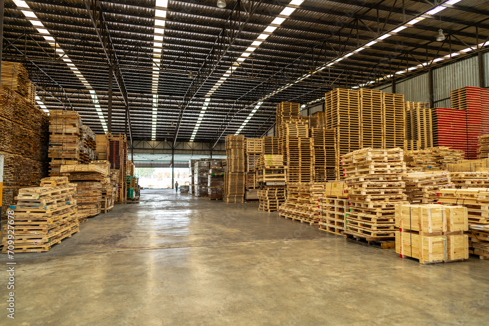 background of pallet wood in warehouse. pattern wood section. Grid of wood squares. the raw of material timber on stack. background of pallet wood in warehouse. pattern wood section. Grid of wood squares. the raw of material timber on stack.