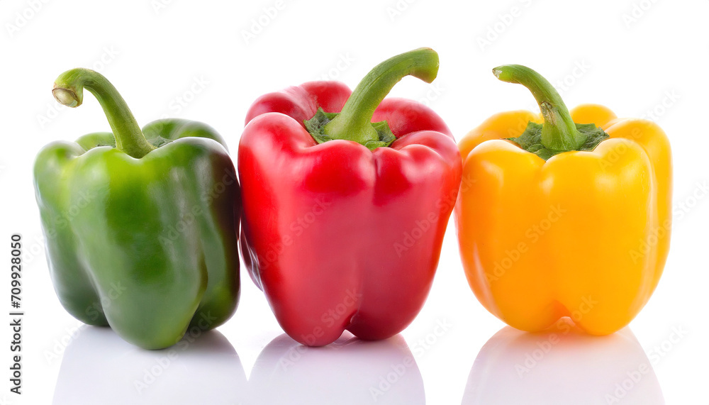 Red, green and yellow bell peppers isolated on white background Red, green and yellow bell peppers isolated on white background