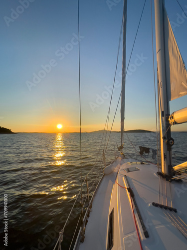 sailboat at the gold sunset