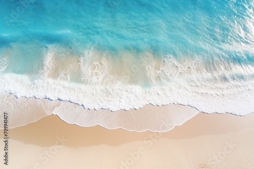 Soft blue ocean waves on the coastline with beautiful clean sand. nobody.