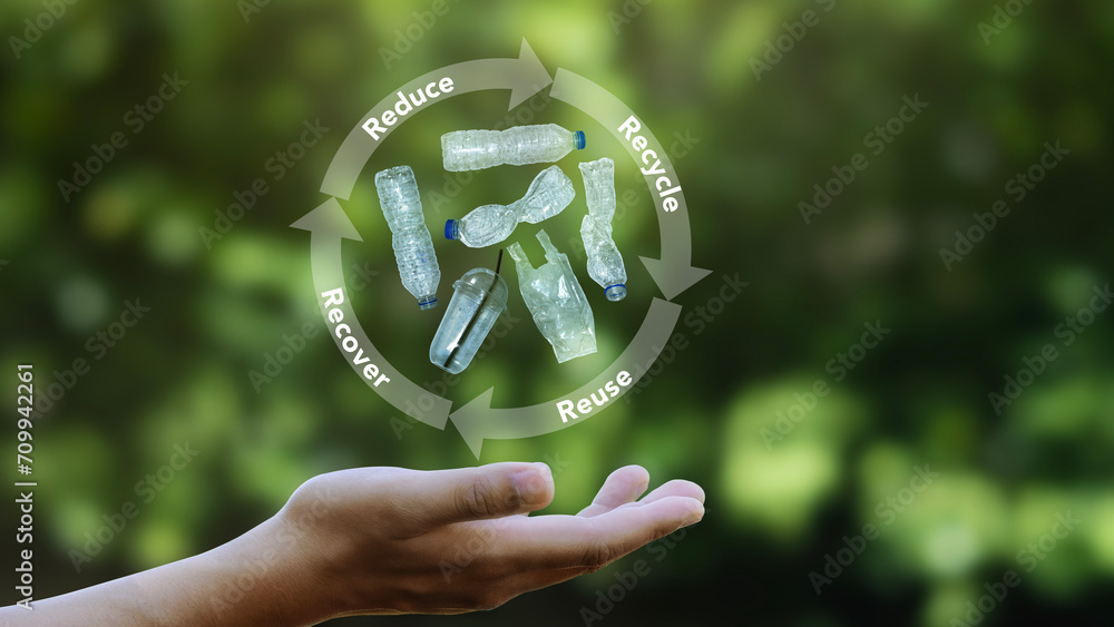 Plastic bottles and plastic bags on the palm Concepts of reduce, reuse ...