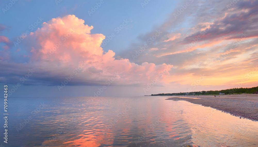 Sunset sky panorama with bright glowing pink Cumulus clouds. sun and reflection in sea