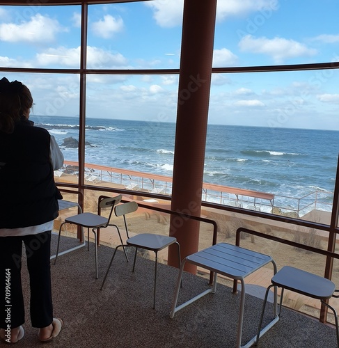 person watching the ocean