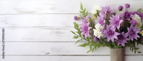 Flower bouquet on white wooden background, copy space for text . Springtime Concept. Mothers Day Concept with a Copy Space. Valentine's Day with a Copy Space. 