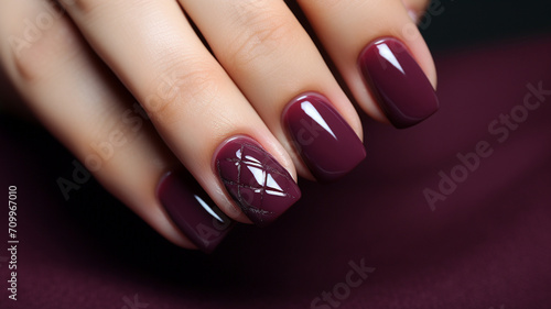 Canvas Print Woman hand with burgundy color nail polish on her fingernails