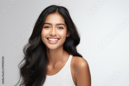 model woman smiling with clean teeth. used for a dental ad. isolated on white background