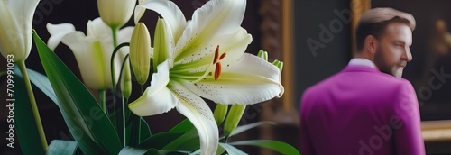 lily flowers and handsome man on background Beautiful White Lily flower close up. Background with flowering bouquet. Inspirational natural floral spring blooming garden park. Ecology nature concept