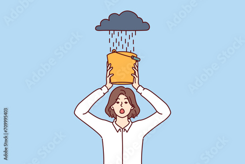 Woman afraid of rain, covering head with bucket of water, for concept of business problems and crisis situation. Girl in formal wear stands under cloud with shower and needs help from crisis manager.