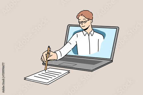 Business man takes notes on paper, looking out of laptop screen during online lecture for students. Consultancy provides remote business assistance services for entrepreneurs and company managers