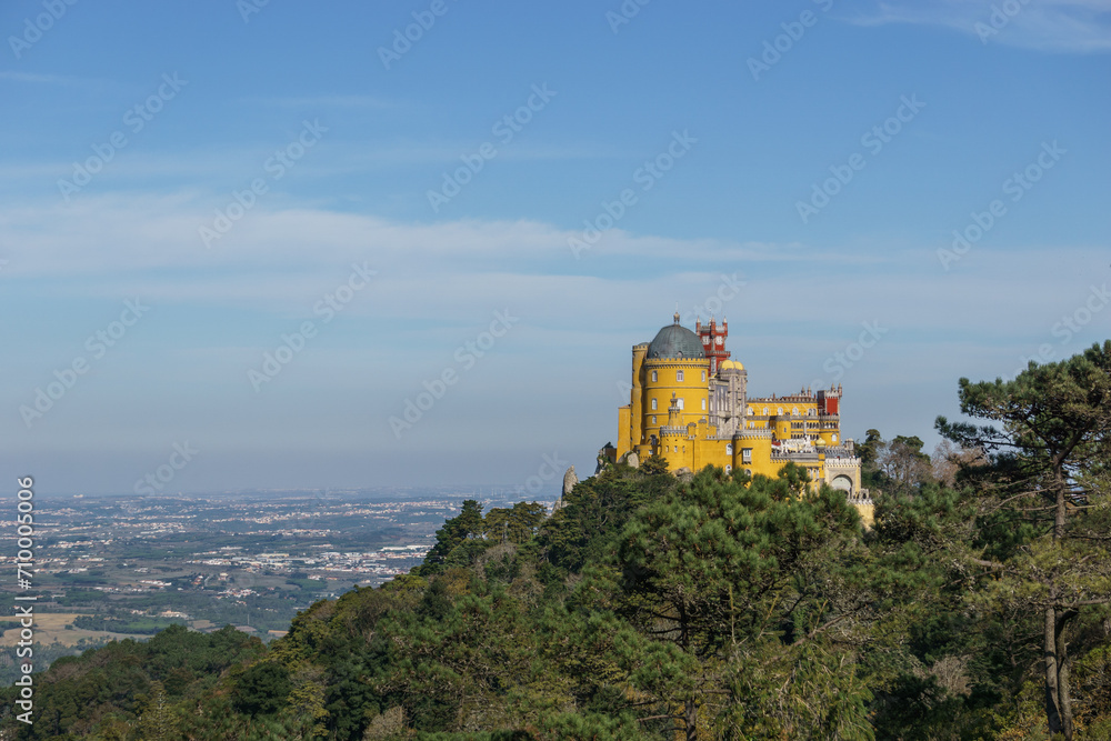 Palace of Pena on top of a hill between forest in Sintra. Lisbon, Portugal