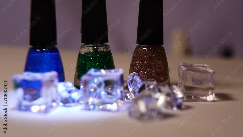 Multicolored nail polish bottles, play with light Multicolored nail polish bottles, play with light