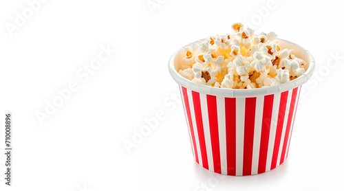 red white paper bucket full of popcorn on isolated. cine. film. 