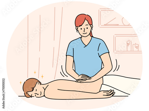 Woman do manual massage for client