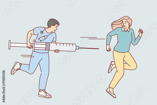 Cowardly woman suffers from Vaccinophobia and runs away from doctor with large syringe