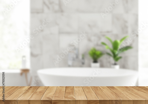 White bathroom interior. Empty wooden table top with plant for product display with blurred bathroom interior background