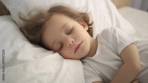 Caucasian child sleeping in the bedroom.