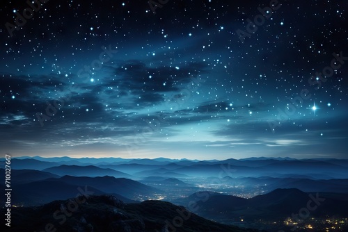 A breathtaking starry sky above silhouette mountain range at night