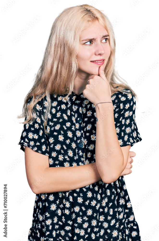Young caucasian woman together with hand on chin thinking about question, pensive expression. smiling with thoughtful face. doubt concept. Young caucasian woman together with hand on chin thinking about question, pensive expression. smiling with thoughtful face. doubt concept.