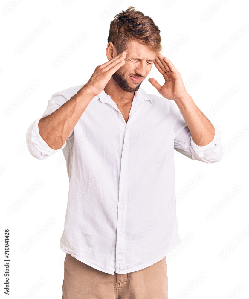 Young caucasian man wearing casual clothes with hand on head for pain in head because stress. suffering migraine. Young caucasian man wearing casual clothes with hand on head for pain in head because stress. suffering migraine.