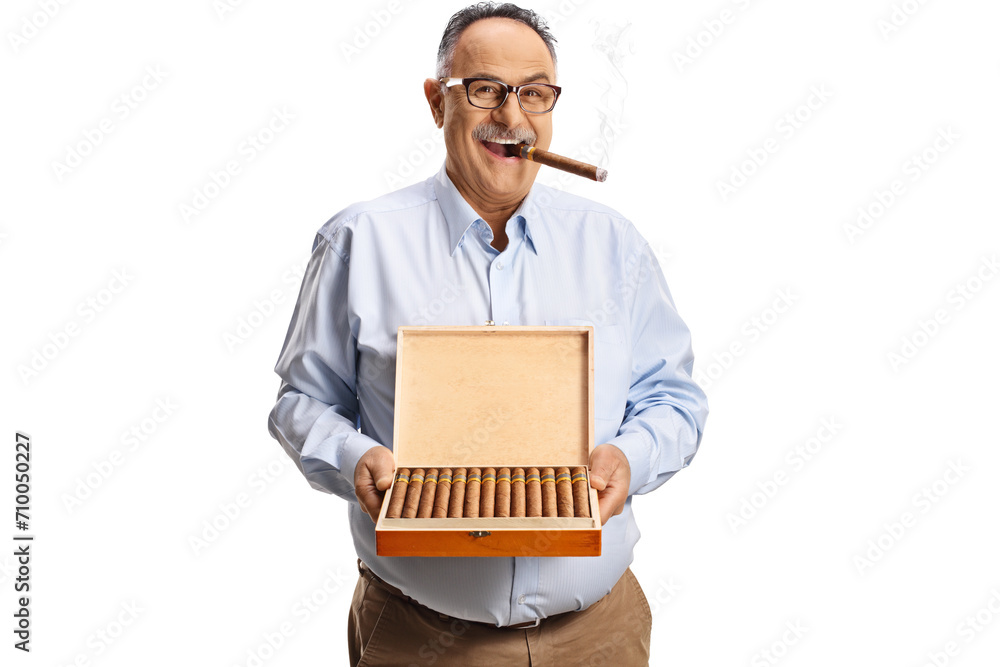 Mature man with a box of cuban cigars Mature man with a box of cuban cigars