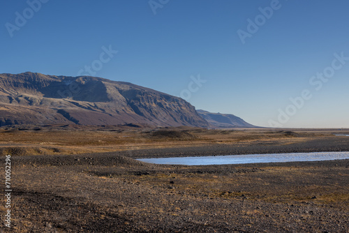 Autumn country and water of fjord, East Iceland
