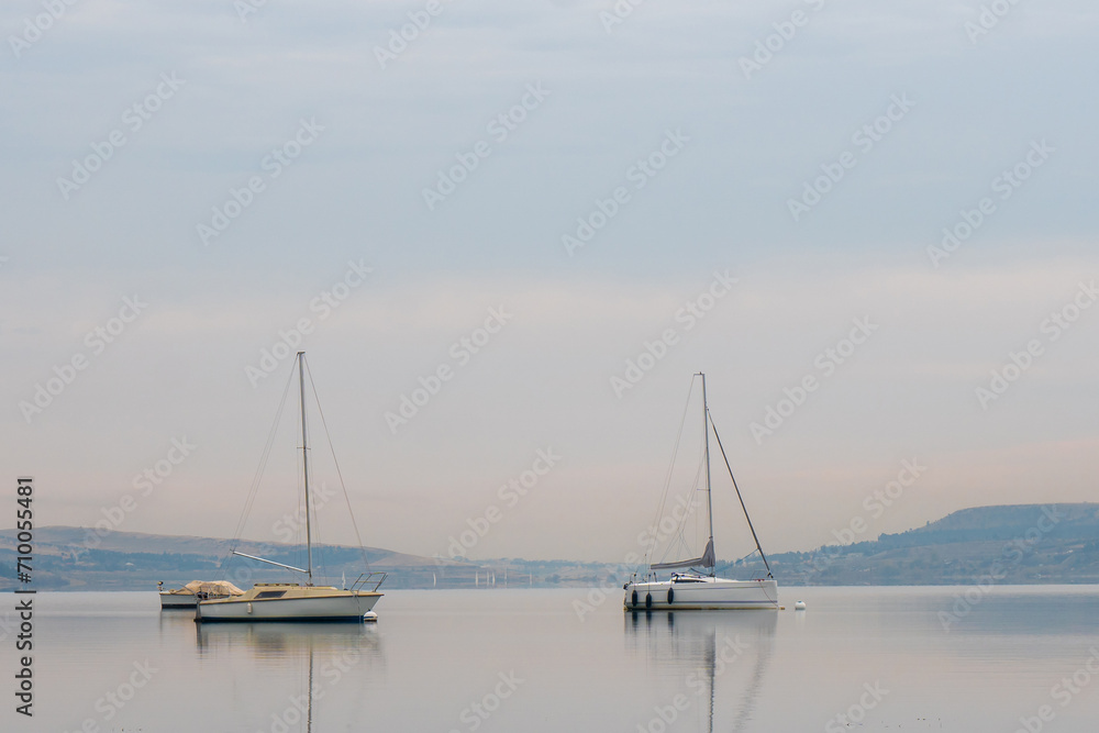 Tbilisi sea, reservoir and boats with deflated sails Tbilisi sea, reservoir and boats with deflated sails