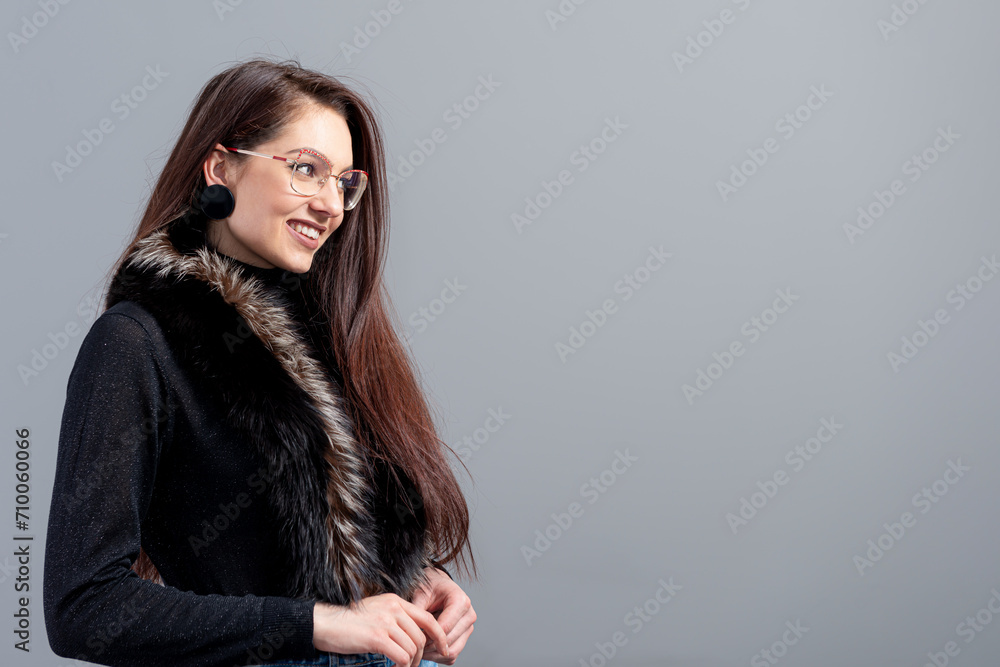 portrait of sensual woman in glasses with long hair against gray background portrait of sensual woman in glasses with long hair against gray background