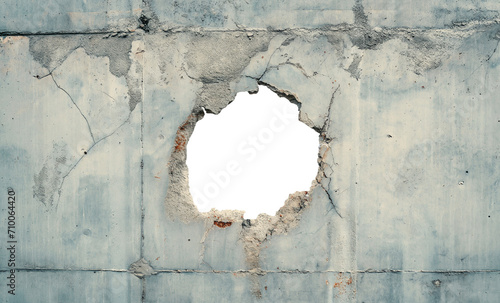 torn hole in a old cracked concrete wall. Peeling old wall. Cracked and peeling, Grunge wall texture. Worn aged post apocalyptic texture background with a hole in the wall. horizontal