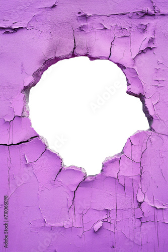 torn hole in a old cracked purple concrete wall. Peeling old purple paint. Cracked and peeling, Grunge wall texture. Worn aged post apocalyptic texture background with a hole in the wall.