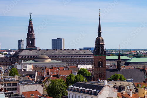 Christiansborg Slot Palace, Church of Holy Ghost, Nikolaj Kunsthal Contemporary Arts Centre and historical buildings in center of Copenhagen, Denmark. View from Round Tower (Danish: Rundetaarn) photo