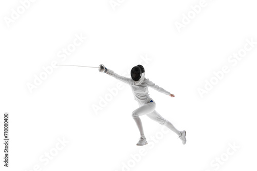 Strength and grace. Illustrating the combination of strength and grace necessary in the art of fencing. Female athlete, fencer in motion over white background. Concept of sport, competition, hobby