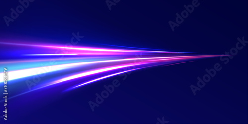 Glowing spark swirl trail tracing on dark blue background. Abstract light lines of movement and speed. Light line moving with speed.	