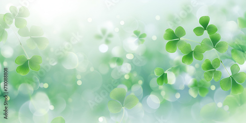 Abstract blurry green lucky shamrock leaves background