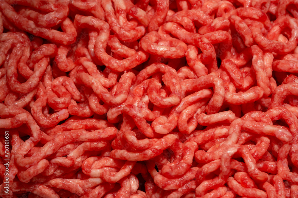 Raw minced beef close-up, top view. Raw minced beef close-up, top view.