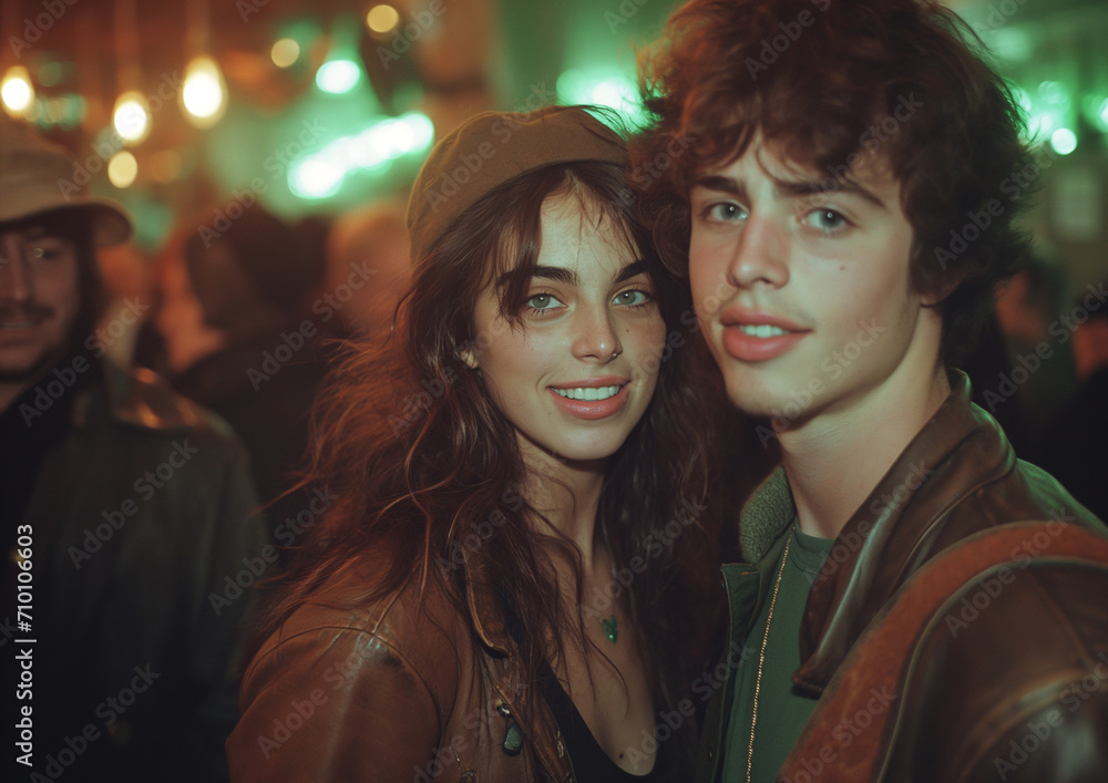 Young Couple in Brown Leather Jackets Enjoying a Night Out

