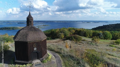 Aerial drone flight over wooden church in Vytachiv, Kyiv oblast., Ukraine. photo
