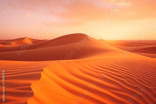 Amazing desert sunset. Beautiful Arabian desert with warm colors. Colorful contours of sand dunes at Abu Dhabi. photo