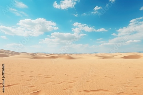 Dry desert landscape. Hot lifeless sand of desert and blue sky in summer sunny day. Flat desert of Egypt. Travel and tourism concept.