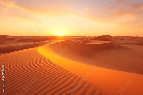 Sunset over the desert of Al Khatim in Abu Dhabi Emirates. Golden Sand Dune Desert Landscape Panorama. Beautiful sunset over the sand dunes in the Al Khatim in Abu Dhabi Emirates